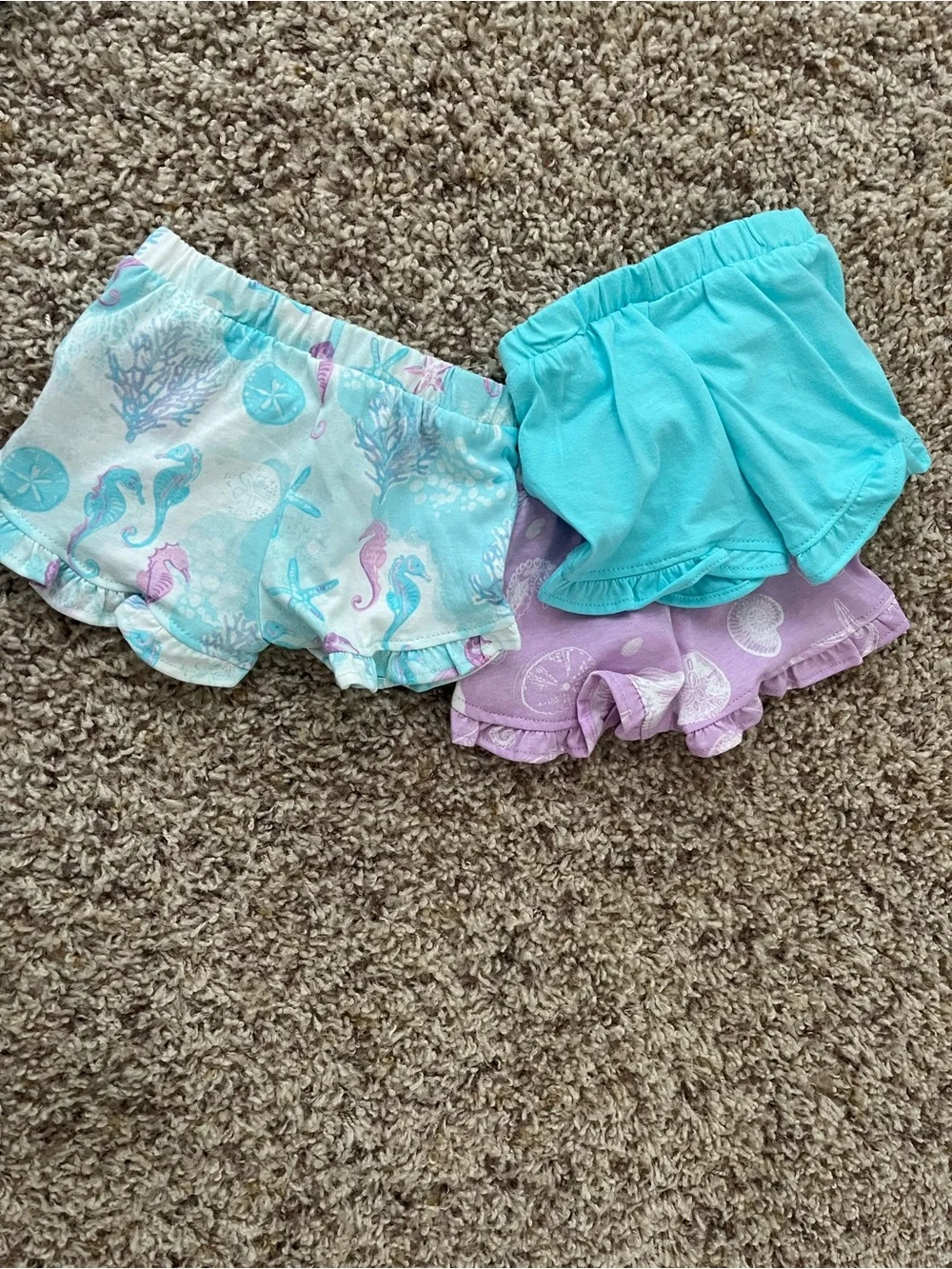 The Children’s Place Newborn 5 Bodysuits & 3 Shorts Set in Pastel Seashell Print